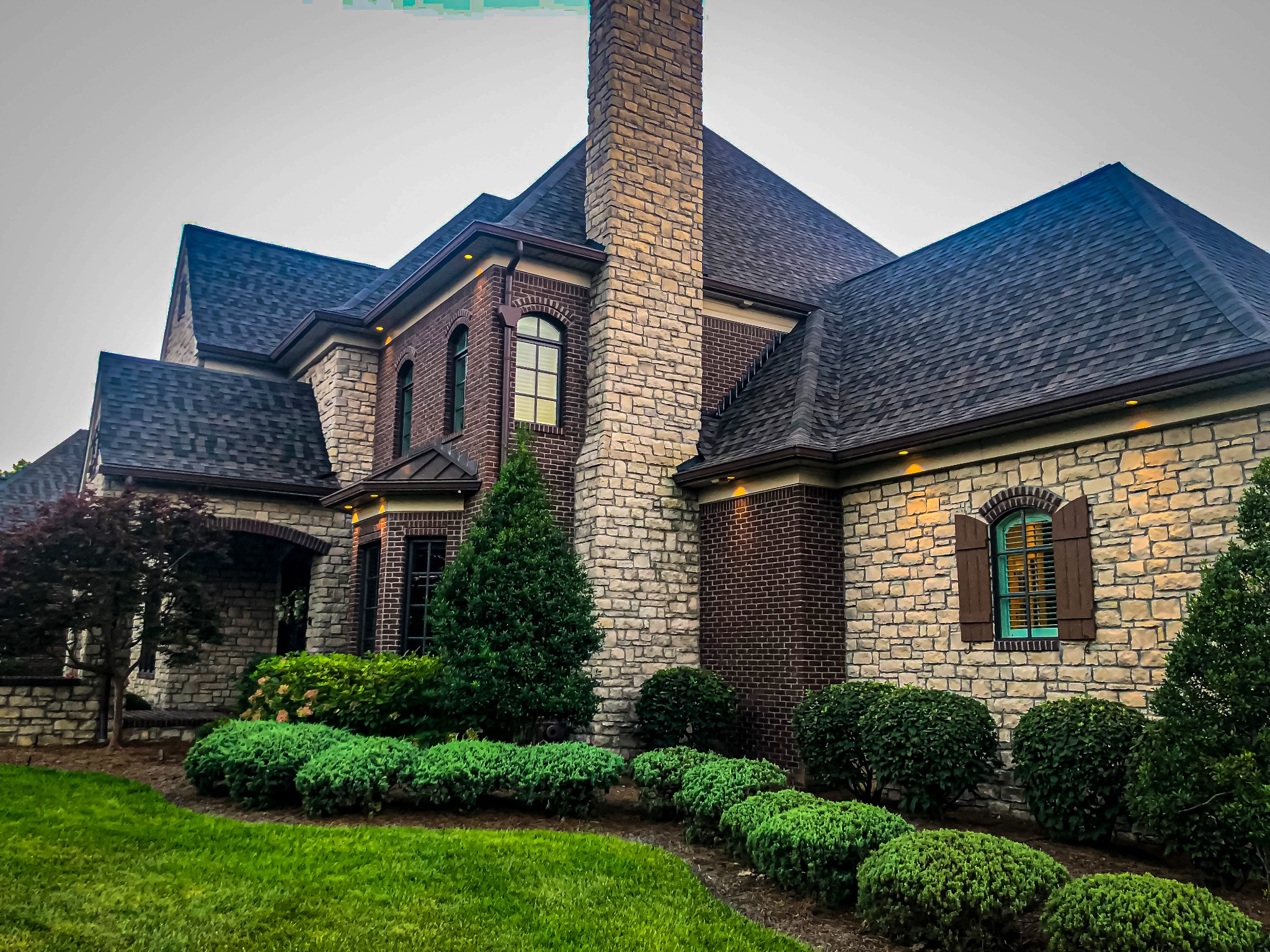 Detailed exterior stonework and landscaping