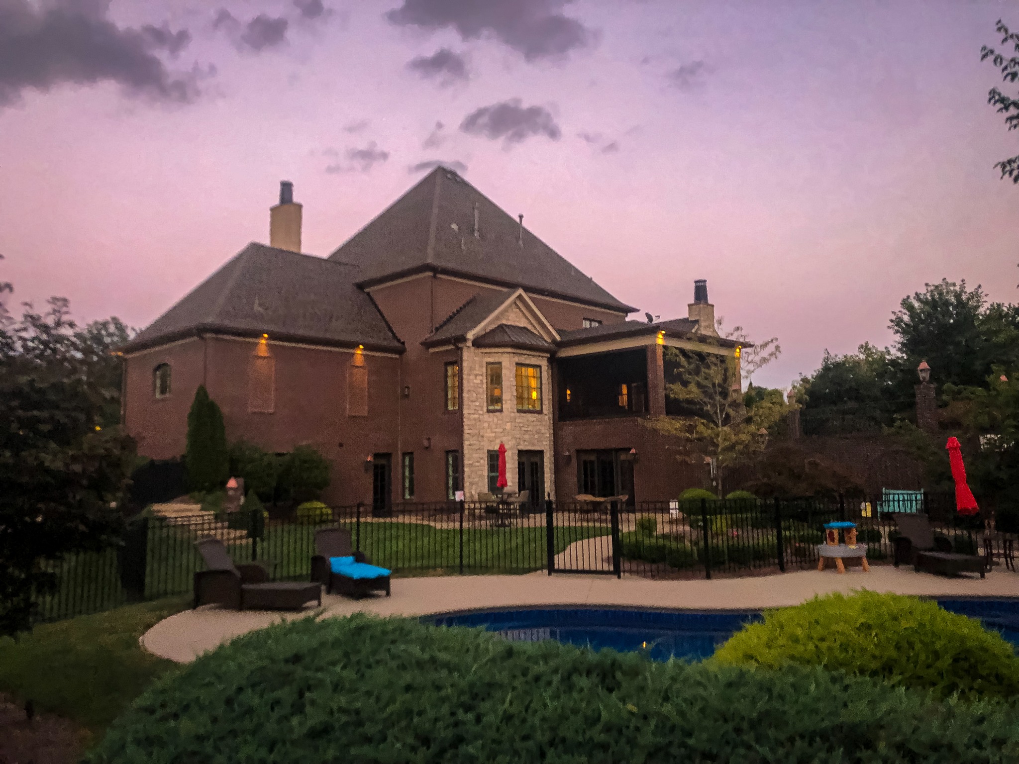 Residence and swimming pool at dusk